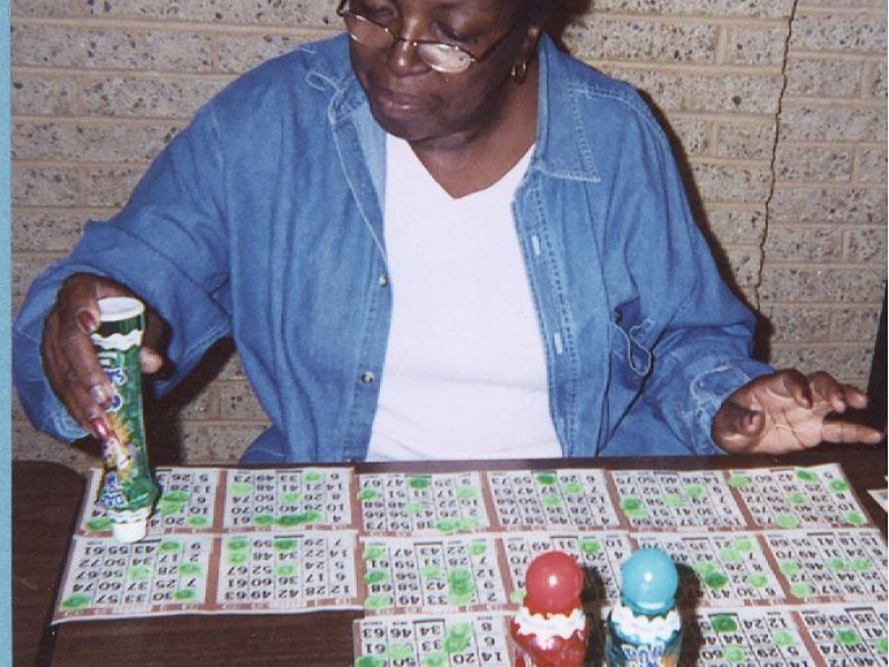 a women stamps bingo cards