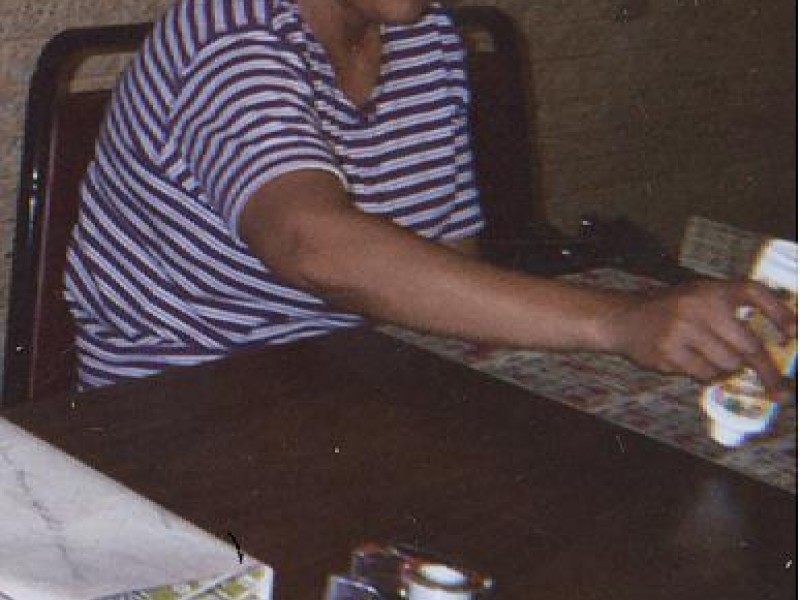 a woman with a stamp and bingo cards