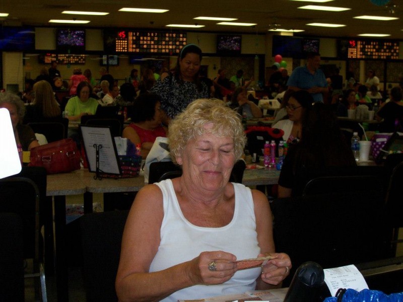 woman laughs at bingo