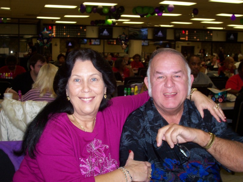 couple smile at a bingo party