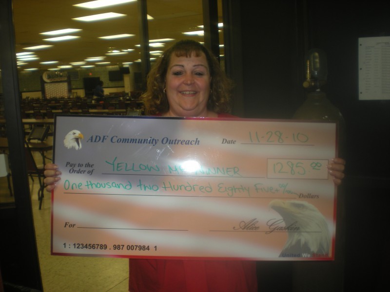 woman hold giant check