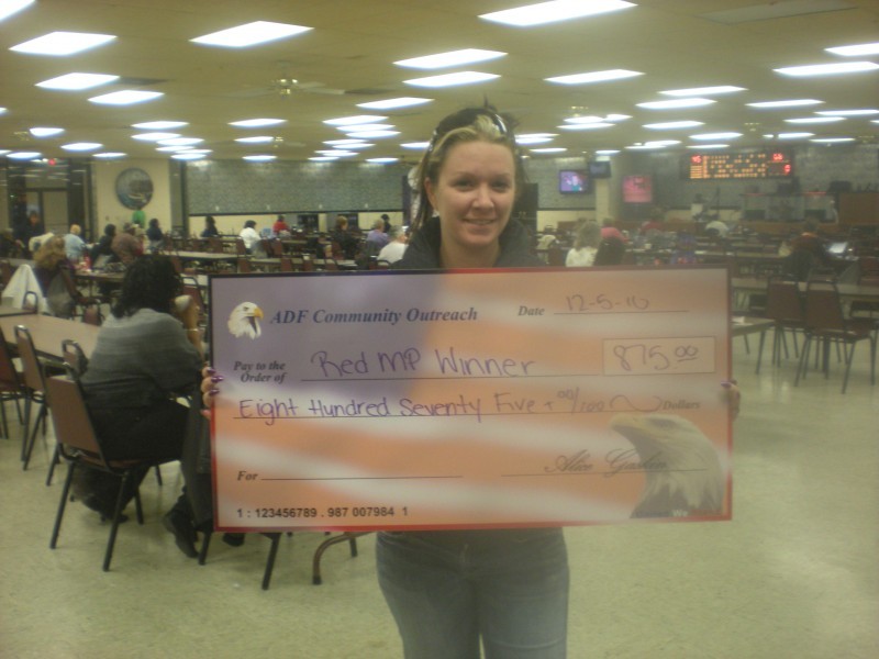woman holding giant check