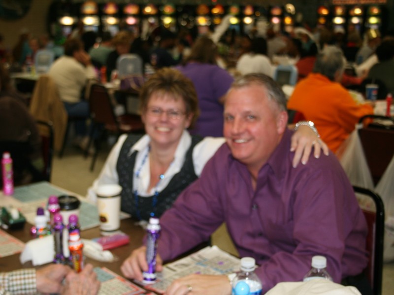 woman with arm around man at bingo