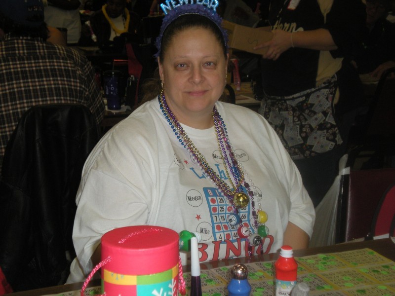 woman in bingo shirt celebrates new years with bingo